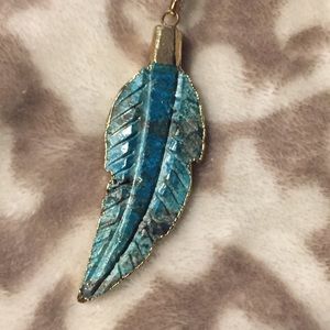 Long carved feather necklace